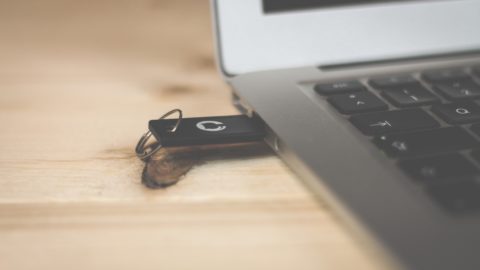 USB plugged into a macbook: example of technology for business