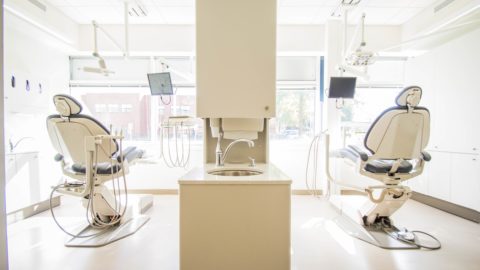 Inside clinic offering veneers in Glasgow with two dentist chairs
